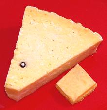 Wedge of Romy Cheese