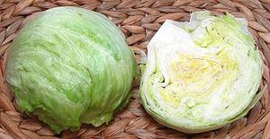 Whole and Cut Heads of Iceberg Lettuce