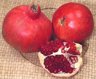 Whole and Broken Pomegranate Fruit
