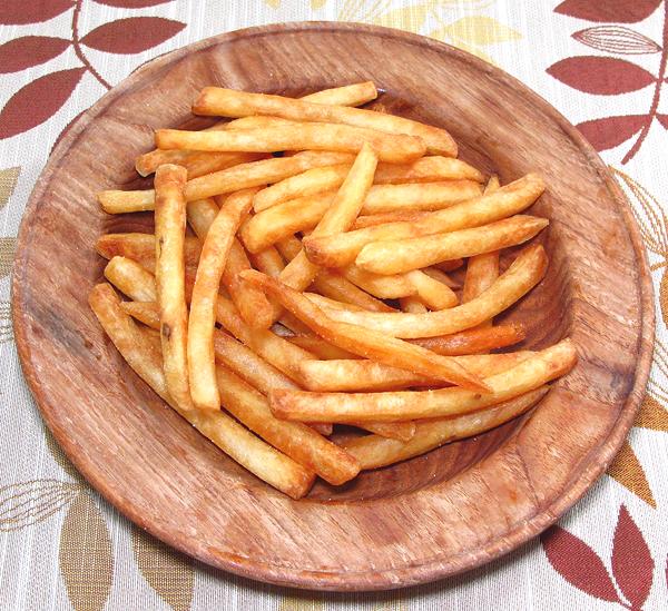 Wooden Plate of French Fried Potatoes