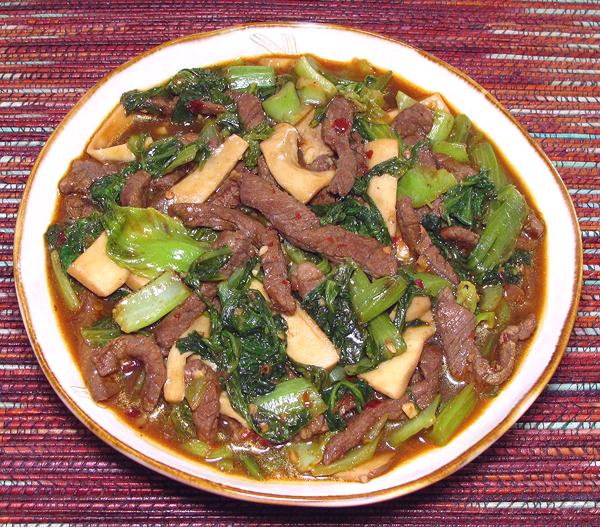 Dish of Beef with Mustard Greens