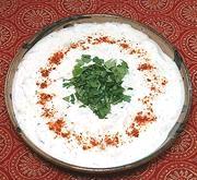 Bowl of Idli in Yogurt Sauce