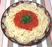 Dish of Pasta with Tomato & Onion Sauce