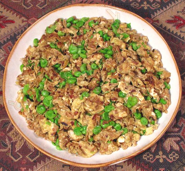 Bowl of Egg Curry with Peas