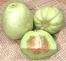 Whole and Cut Green Melon