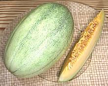 Whole and cut New Century Hami Melon