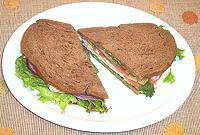 Dish with Turkey Sandwich cut in two