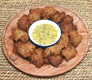 Dish of Fried Malanga Dumplings with Mojo