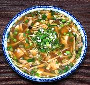 Bowl of Fish Soup with Roasted Herbs