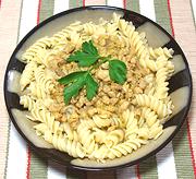 Dish of Pasta with Pork & Saffron Sauce